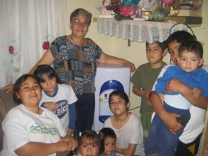 A family with a TWI water purification unit.